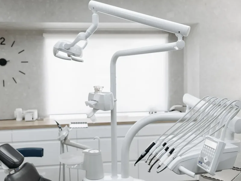 Modern dental light and equipment in a bright treatment room